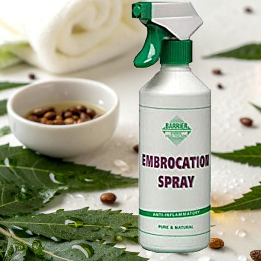 Barrier Embrocation Spray bottle for horses with leaves and a bowl in the background