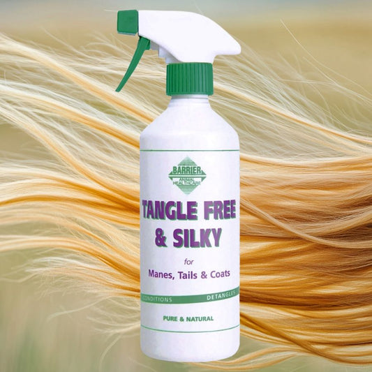 Bottle of Barrier 'Tangle Free & Silky' product with a green and white label on a background of blonde hair.
