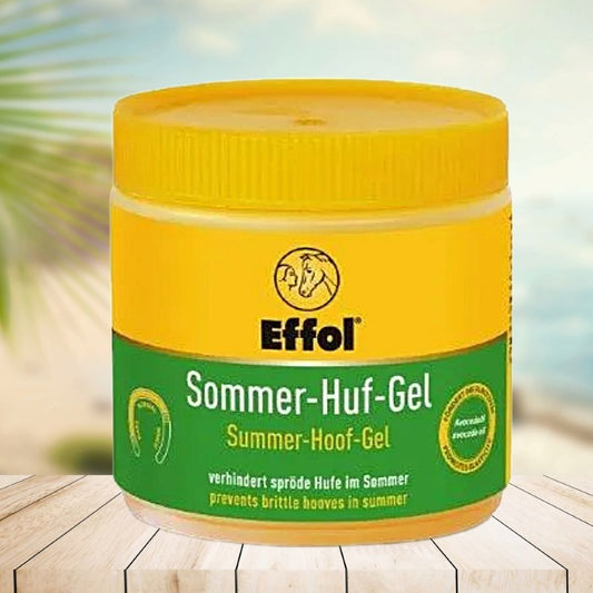 Yellow and green jar of Effol Summer-Hoof-Gel for horses on a wooden surface with blurred background