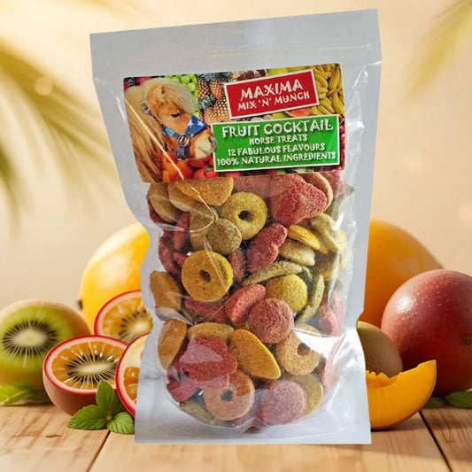 Maxima Mix 'N Munch Fruit Cocktail horse treats packaging with fruits in the background