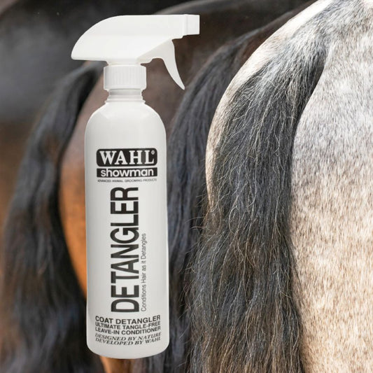 Wahl Showman Detangler spray bottle with horses tails in the background.